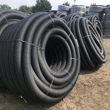 Load image into gallery viewer, 100mm perforated land drainage pipe (25m coil)